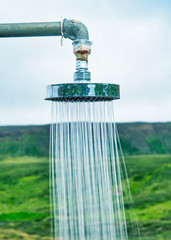 Close up of shower in open air countryside