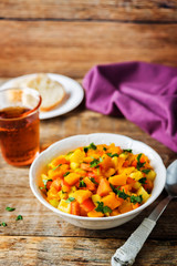Pumpkin potato carrot stew in the bowl