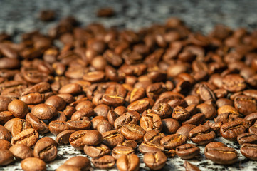 grains of black coffee on a granite table2