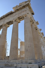 Fototapeta premium Athens, Greece, 10.28.2019. Ruins of Parthenon temple on a bright day in Athenian Acropolis - world heritage site. Religious building of ancient times. 