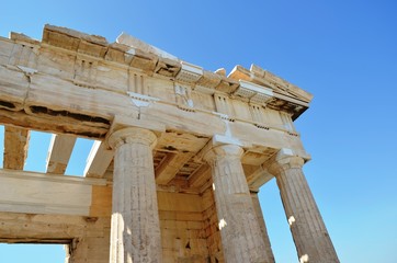 Athens, Greece, 10.28.2019. Fragment of Propylaea, entrance to the Athenian Acropolis on a bright day - world heritage site. Religious building of ancient times. 