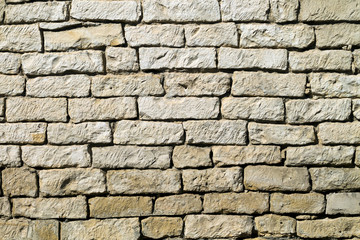 Obraz premium Typical natural stone brick wall texture