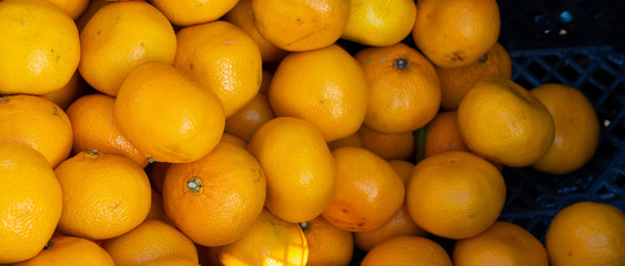 Tangerines as background and texture.