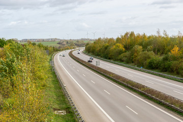 road in the countryside - german autobahn in an autumn landscape