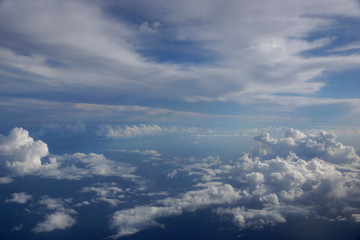 Aerial of Fluffy Clouds in a blue sky