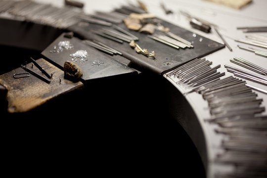 jeweller workshop with tools on table for precious metal jewellery work