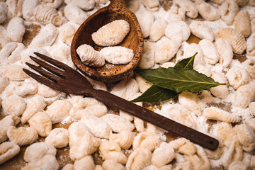 Fototapeta premium Homemade gnocchi, prepared on the table with ingredients.