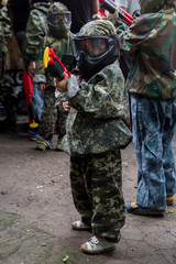  little soldier. The game of pinball. Camouflage on children. Gunshot. Red gun