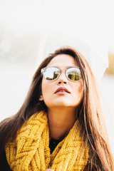 Defiant attractive sexy brunette in sunglasses
