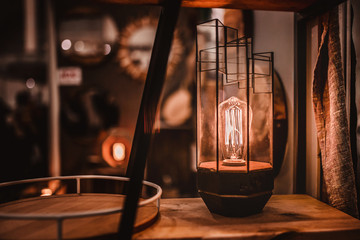 Cozy atmosphere - a warm, vintage lamp with dim light