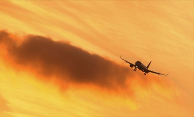 passenger plane lands at sunset