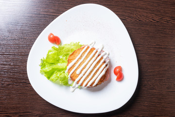 Potato pancakes with ham and herbs.