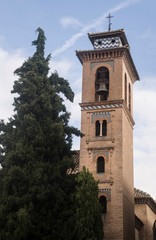 Fototapeta na wymiar ancient bell tower in the old Granada, Spain
