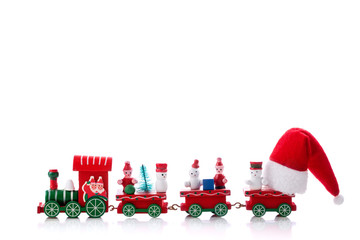 Toy of christmas train with Santa Claus Hat isolated on white background