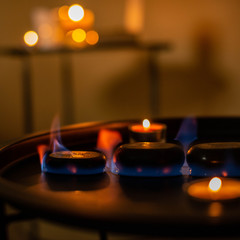 candles and butning stoun for massage