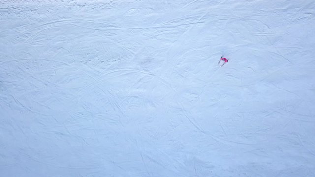People skiing down a flat slope. 4K UHD video, 240fps, 2160p.