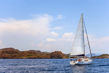 ship white sails a yacht mountains background luxury summer adventure