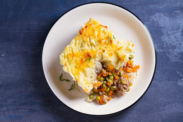 Classic homemade Shepherd's Pie (mashed potato and beef or lamb with vegetables). View from above, top