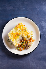 Classic homemade Shepherd's Pie (mashed potato and beef or lamb with vegetables). View from above, top