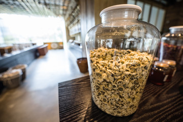 Glassware with canned food and cooking ingredients.