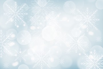 blue christmas background with snowflakes bokeh blurred 