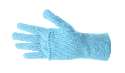 Woman wearing blue glove on white background, closeup. Autumn clothes
