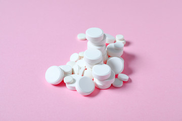 Many pills on color background
