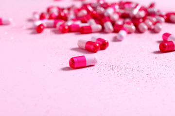 Many pills on color background