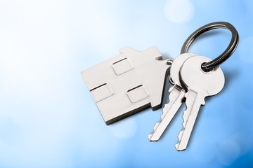 House shaped keychain and keys isolated on