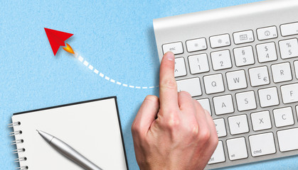 hand hitting ESCAPE key on keyboard and an airplane illustration flying away