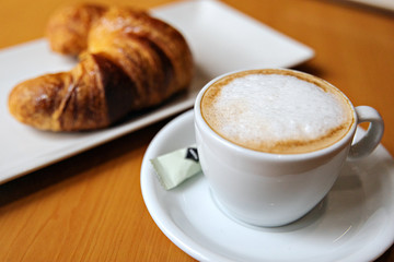 cup of coffee and croissant