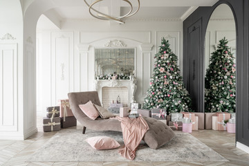 Christmas morning. Classic luxurious apartments with decorated christmas tree and presents. Living...