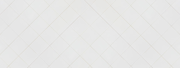 white tiles wall texture marble ideal for background and used in interior design.