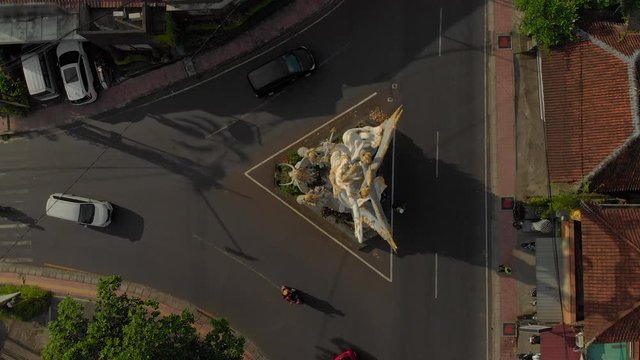 Stone sculpture of Arjuna on a road cross in Ubud town, Bali island, Indonesia. Arjuna is a hero of the ancient Indian epic Mahabharata