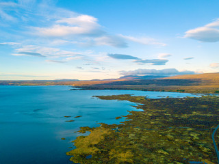 Naklejka na ściany i meble Aerial view on Iceland lake, Icelandic lake drone photo.