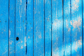 Fototapeta na wymiar Blue painted old wooden vintage texture background with sand on it. Blue abstract background.