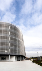 Fototapeta premium Modern parking building with large aerated facade