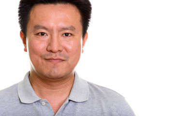 Obraz premium Studio shot of Japanese man isolated against white background