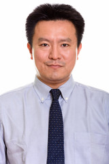 Studio shot of Japanese man isolated against white background