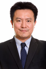 Studio shot of Japanese man isolated against white background