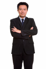 Studio shot of Japanese man isolated against white background