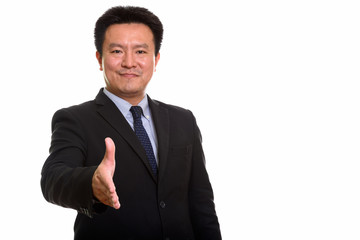 Studio shot of Japanese man isolated against white background