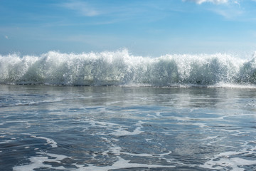 Big surf waves breaking at Kuta beach