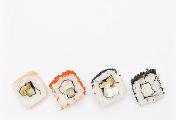 Japanese rolls on white background.