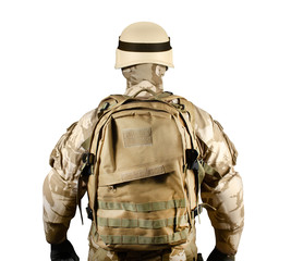 Isolated soldier in uniform standing fully equipped rear view.