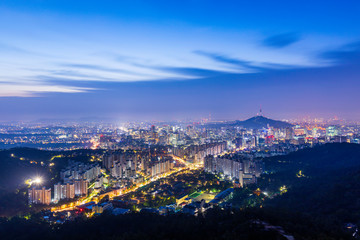 Sunrise of Seoul Downtown cityscape . Aerial view of Nansan Seoul Tower and lotte tower. Viewpoint from Ansan mountain best landmark of Seoul , South Korea
