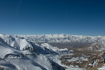 View landscape with Himalayas mountains range between Khardung La road pass go to Nubra Valley in Hunder city while winter season at Leh Ladakh in Jammu and Kashmir, India