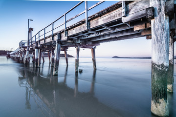 Under the Causeway looking toward the Bluff, Encounter Bay, Victor Harbor, South Australia. - obrazy, fototapety, plakaty
