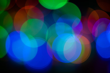 Colorful abstract bokeh lights  background.Abstract blurred bokeh Christmas or New Year lights in background.