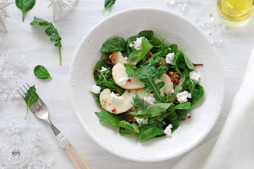 Pear salad with arugula, babyleaves ,cottage cheese, and walnut